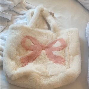 Pink bow faux fur tote bag